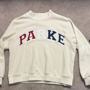 Parker Cream Sweater with Red, White, and Blue Lettering